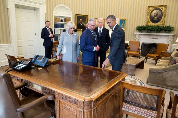 U S Presidential Desk "Resolute Desk" in antiqued mahogany finish- hand carved mahogany with full grain leather top